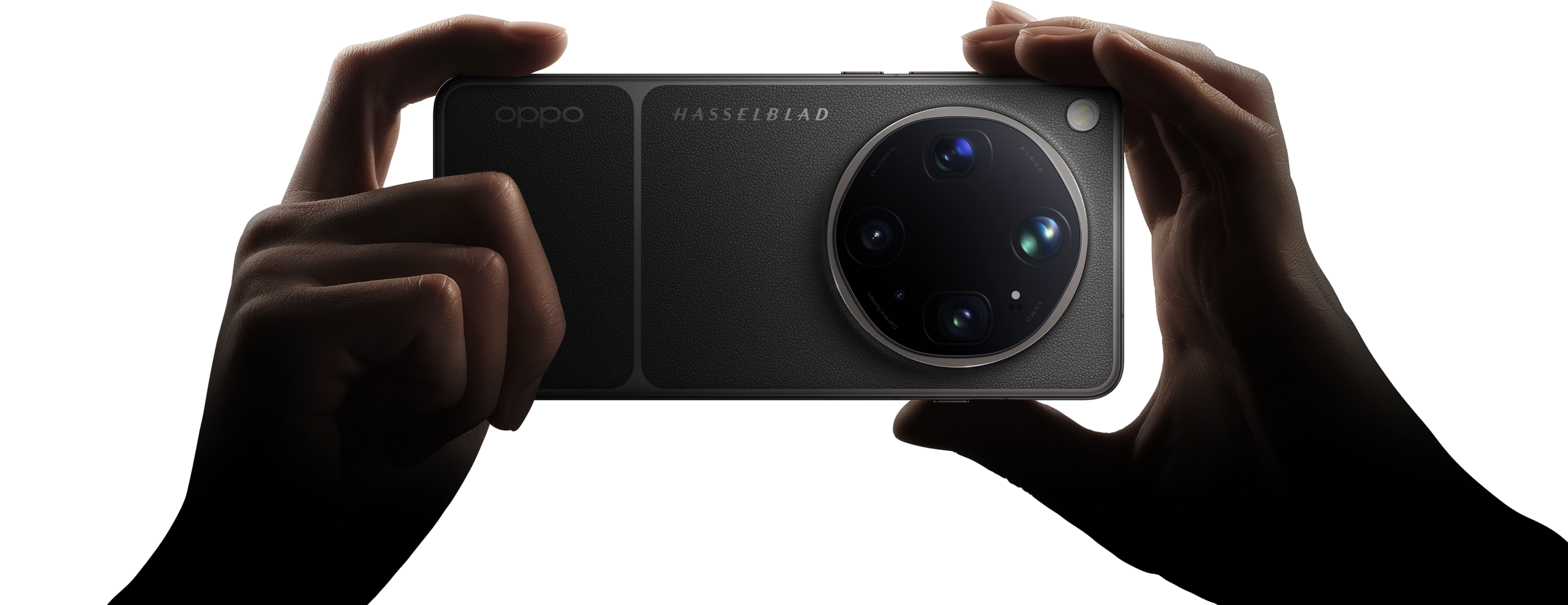 The Find X9 Ultra held landscape — the Hasselblad co-branding is prominently displayed, reinforcing its identity as a camera first.
