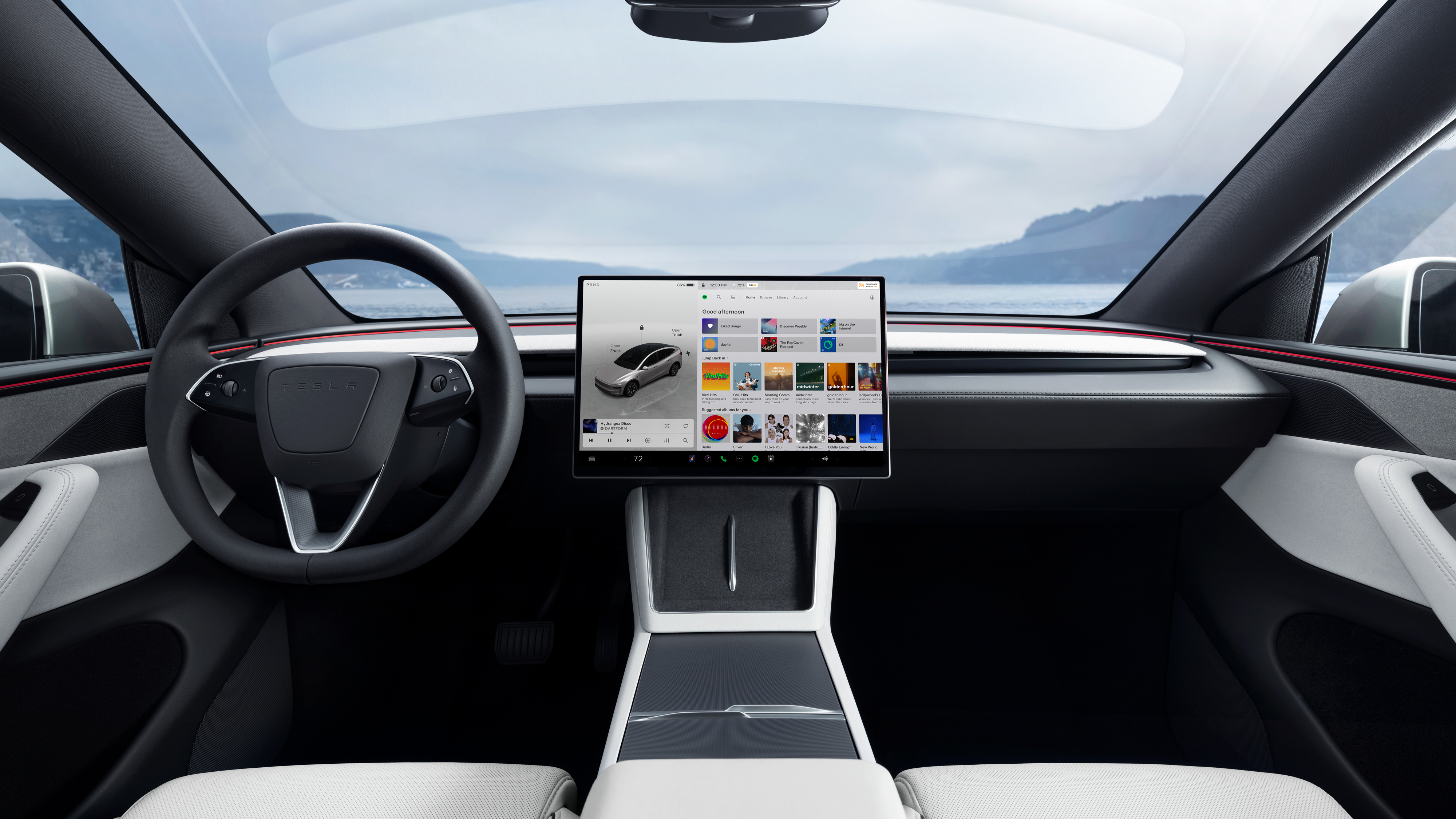 The interior carries over Tesla's minimalist dashboard and large central touchscreen — now paired with white vegan leather for a more premium feel in the L. Image: Tesla
